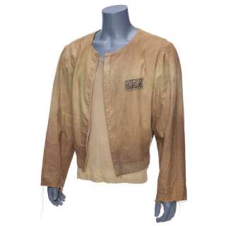 JUDGE DREDD (1995) - Lot #225 : Judge Joseph Dredd‘s (Sylvester Stallone) Prison Jacket and Shirt with Rico Dredd‘s (Armand Assante) Distressed Prison Costume
