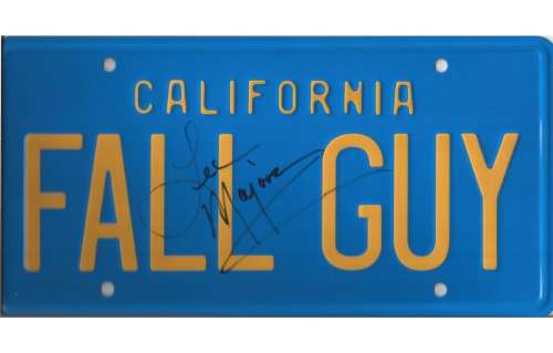 Lot 192 - The Fall Guy TV series prop metal license tag from the truck signed by Lee Majors on the tag