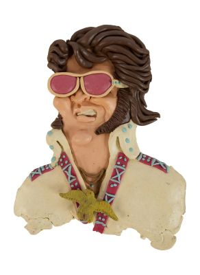 Paul Reubens | Lot 71 - “Penny" - Original Claymation “Elvis” Figure from “Pee-wee’s Playhouse” | Julien’s