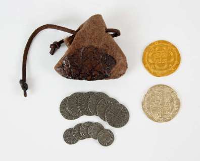 Pirates of the Caribbean: On Stranger Tides (2011) Two large metal coins and a punch containing… | Ewbank’s