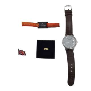 G20 Oliver Everett (Douglas Hodge) Screen Used Watch, G20 Wrist Band, Ring & UK Pin | VIP Fan Auctions