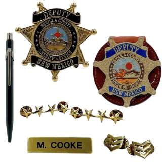 Eddington Michael (Michael Ward) Screen Used (2) Star Pins, (2) Rank Pins, Hero Pen, (2) Deputy Badges & Metal Name Tag | VIP Fan Auctions