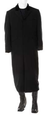 Lot 683 - Kurt Russell ‘Wyatt Earp‘ signature duster and boots from Tombstone.