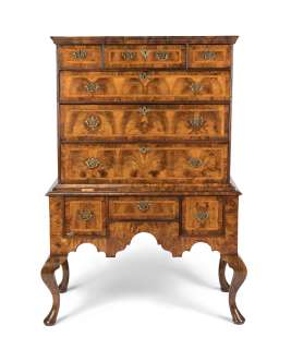 The Crown | A George I and later walnut crossbanded and featherbanded chest-on-standFirst seen in Season 5, in the Diana Kensington Palace Apartments set | Bonhams