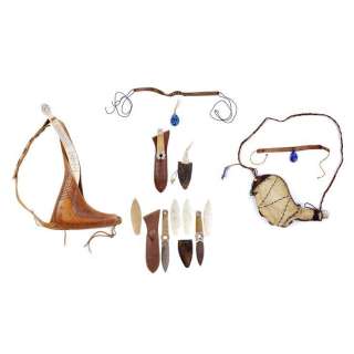 The Last Airbender (2010) - Lot 899 - Katara‘s (Nicola Peltz) Necklaces and Water Skin and Sokka‘s (Jackson Rathbone) Boomerang and Daggers