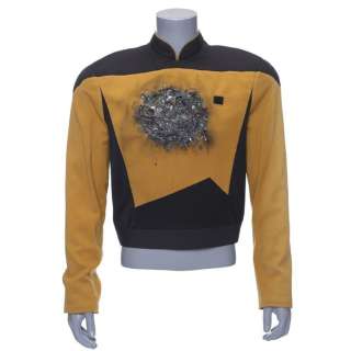 STAR TREK: THE NEXT GENERATION (1987-1994) - Lot 375 - Data‘s (Brent Spiner) Screen-Matched Distressed Starfleet Uniform Jacket