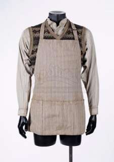 Lawless | Forrest Bondurant’s (Tom Hardy) Blackwater Station Shirt, Vest, and Apron | Propstore