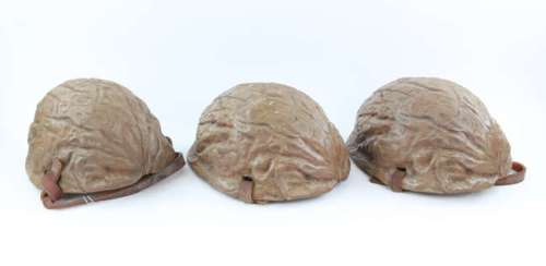 Lot 3099 - The Borrowers (1997) Three Walnut helmets from the family comedy starring John Goodman and Jim…