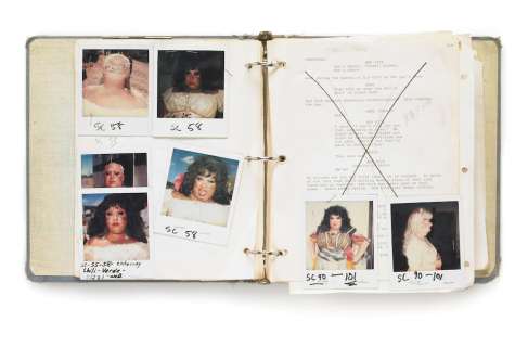 A George Masters working script filled with Polaroids of Divine and others from "Lust in the Dust" | Bonhams