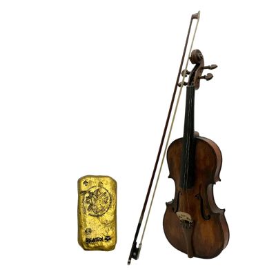 Lot 179: The Bluff Issac Screen Used Gold Bar, Violin Bow & Violin | VIP Fan Auctions