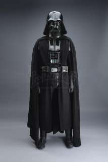 STAR WARS: A NEW HOPE (1977) - Lot 672 - 1977/1978 Darth Vader Promotional Costume With Poster-Matched Helmet