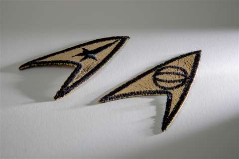 Two Original “Star Trek” Tunic Insignias | Studio Auctions