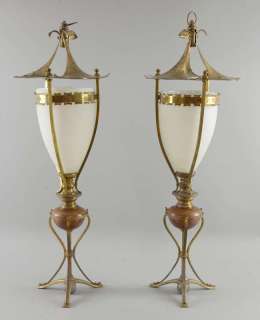 The Golden Compass - Two brass and copper table lamps. Height 21.5in. From the college dining room. | Ewbank’s