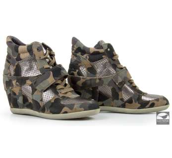 Annie (2014) | Hero Camouflage Wedge Sneakers worn by Miss Hannigan as portrayed by Cameron Diaz in Annie | Blacksparrow