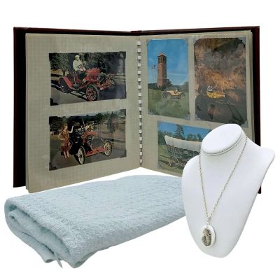 Lot 129: The Handmaid’s Tale Baby Nichole Screen Used Blanket, Pendant & Photo Album Ep 305,605 | VIP Fan Auctions