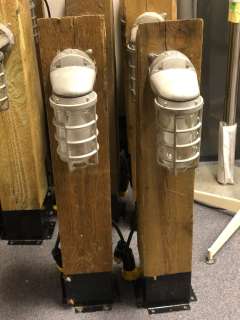 "Snowpiercer" - group of 8 lightbulbs on wooden blocks (3 ft tall each) | Direct Liquidation