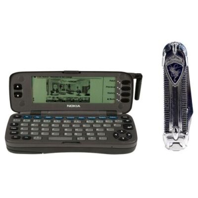 THE SAINT (1997) - Lot #1099 : Planet Hollywood Collection: Simon Templar‘s (Val Kilmer) Pocket Knife and Nokia 9000 Communicator