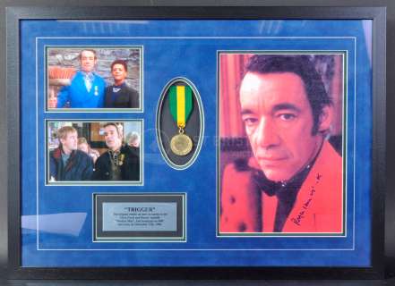 Lot 130 - ONLY FOOLS & HORSES - TRIGGER‘S ROADSWEEPING MEDAL SCREEN USED PROP