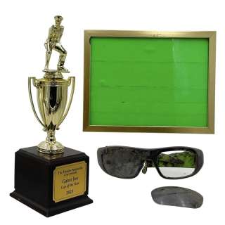 Lot #74: Poker Face Season 2 Joseph ‘Gator Joe’ Pilson (Kumail Nanjiani) Screen Used Glasses, Florida Police Trophy & VFX Photo Frame Ep 204