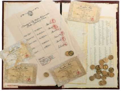 Lot 1174 - Da Vinci‘s Demons prop Medici ledger, vouchers, and coin set.