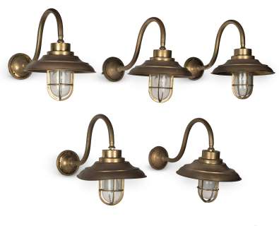 The Crown - Lot 242 - A set of ten brass wall lights, used on the Royal Yacht Britannia set, 20th century Season 2, Episode 2, ‘A Company of Men‘ (10)