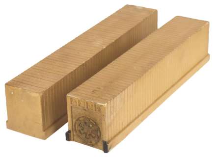 A Pair of Prop Imperial Credit Ingots from “Andor." | Van Eaton Galleries