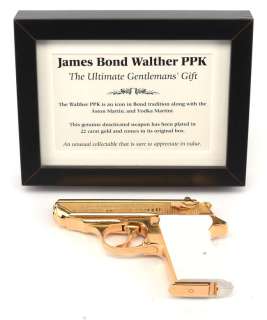 James Bond Walther PPK Gun Walther PPK Gun plated in 22 carat gold with box and small framed sheet… | Ewbank’s