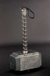 Lot 946 - Chris Hemsworth ‘Thor‘ weighted hero prop Mjölnir hammer from Thor: The Dark World.