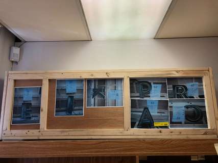 Group of 7 neon letter signs - E/I/K/A/P/C/R crated in wood (dimensions show in photo) from sci-fi s | Direct Liquidation