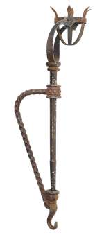 A wrought iron torch from the Witch’s Castle in The Wizard of Oz | Bonhams