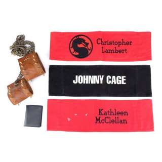 MORTAL KOMBAT (1995) - Lot 536 - Sonya Blade‘s (Bridgette Wilson) Cuffs and Wallet, Johnny Cage‘s (Linden Ashby) Chair Back, and Production-Made Chair Backs