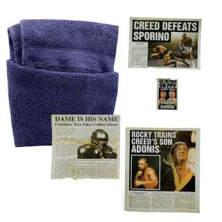 Lot 75 - Creed III Damian Jonathan Majors Production Used Newspaper Clipping Set & Towel - Lot #75 - Creed III Damian Jonathan Majors Production Used Newspaper Clipping Set & Towel: Authentic Auction Item | VIP Fan Auctions