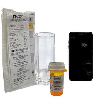 Lot #107: Beau is Afraid Beau Wassermann Joaquin Phoenix Screen Used Pill Bottle, Pill Bag, Phone & Glass Sc 7,22 & 36