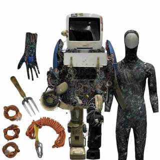 Y2K Cool Blue (Kevin Mangold) Screen Used Body Suit W/ Glove, Legs, Backpack, Head, Front Panel, Upper Arms, Left Hand Claw, Right Hand, Torso Panel, Chest Piece, Rope & Fork | VIP Fan Auctions