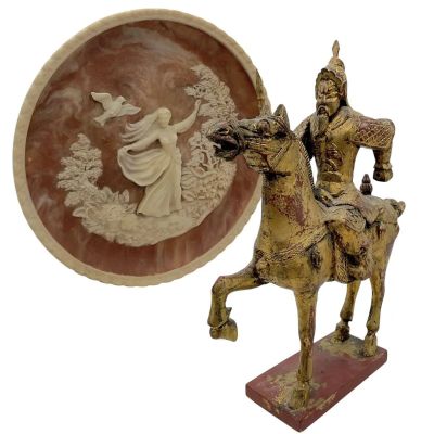 Lot 8: The Handmaid’s Tale Joseph Lawrence Production Used Sculpture & Decorative Plate | VIP Fan Auctions