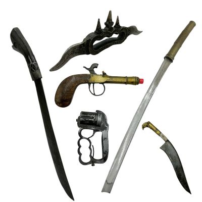 Lot 131: The Bluff Ercell Production Used Rubber Machete, Rubber Pistol, Rubber Tactical Sword, (2) Rubber Knuckle Dusters & Rubber Knife | VIP Fan Auctions