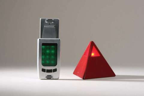 Lot 658 - Alien bomb prop and retracting cellphone from Roswell