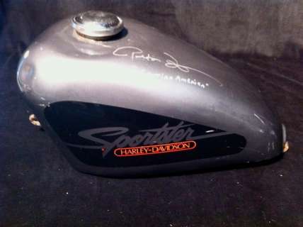 Lot 572 - Easy Rider (1969) A Peter Fonda Autographed Harley Davidson Gas Tank and One Sheet