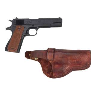 Walking Dead, the (2010-2022) | Daryl Dixon’s (Norman Reedus) Hard Plastic Pistol with Leather Holster | Propstore