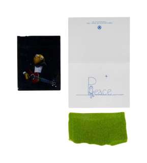 Lot 946 - The Muppets | Kermit The Frog Fur, Eric Clapton Parody Transparency, and Christmas Card