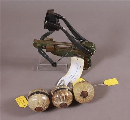 "FLASH GORDON" - PROP CROSSBOW PISTOL AND 3 GRENADES | Apple Tree Auction Center