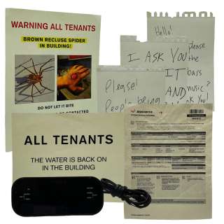 Lot #48: Beau is Afraid Beau Wassermann Joaquin Phoenix Screen Used Spider Flyer, Neighbor Note Set, Water Flyer, Alarm Clock, Tv Remote & Plane Ticket Sc 9,14,16 & 29