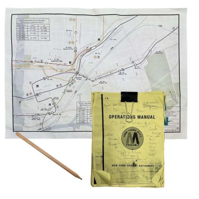 Play Dirty Parker Screen Used MTA Manual, Subway Map & Pencil | VIP Fan Auctions