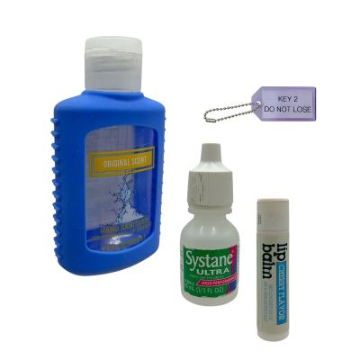 Lot 124: Everything Everywhere All at Once (2022) Waymond Wong (Ke Huy Quan) Screen Used Key Chain, Hand Sanitizer Bottle, Eye Drops Bottle & Lip Balm | VIP Fan Auctions