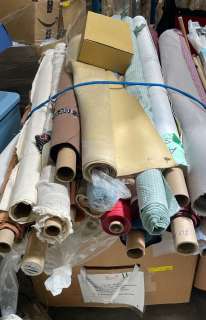 Wardrobe box full of misc. fabric rolls from "The Good Doctor" show | Direct Liquidation
