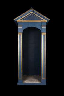 The Crown | A blue and gold painted wood and composition sentry boxFirst seen in Season 1, created by The Crown’s Construction Department | Bonhams
