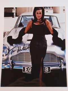 James Bond 007: Tomorrow Never Dies - Teri Hatcher "Paris Carver" with Aston Martin DB5 - Autograph, Photo with COA | Catawiki
