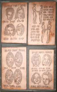 Lot 659 - Hero alien orb, alien history book copper plates & other props from Roswell