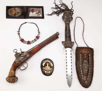 Lot 1182 - Predator 2 Danny Glovers gun, ID badges, necklace