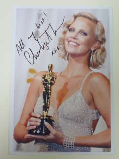 Charlize Theron, signed | Catawiki